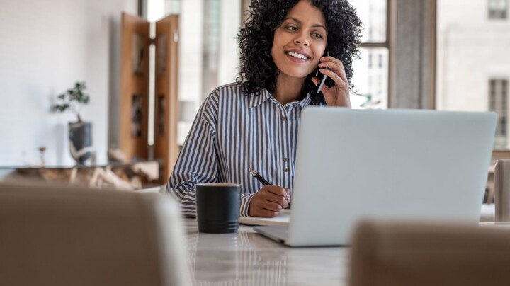 A female employee on a call while working from home
