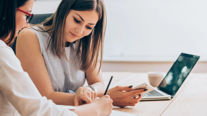 health and safety business partner subscriptions right image of two women collaborating at work