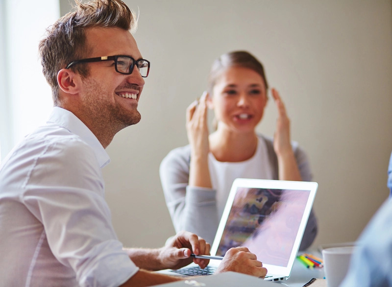 health and safety business partner subscriptions image of a man on a laptop in a meeting