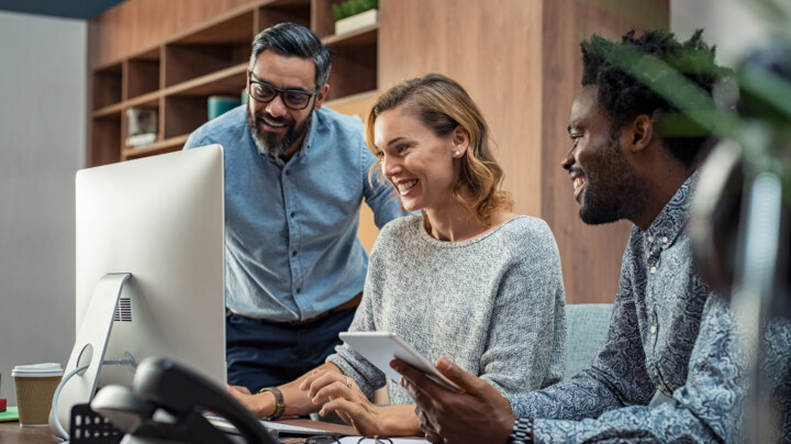 Diverse and happy employees working together