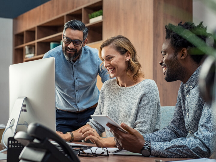 Diverse and happy employees working together