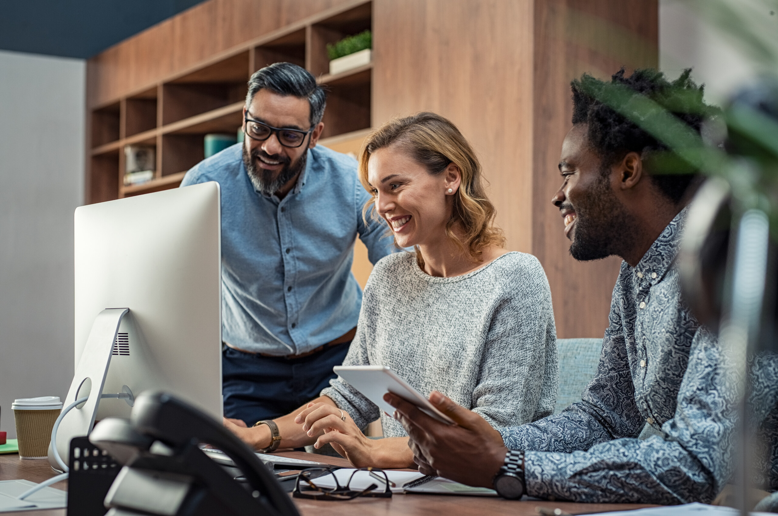 Diverse and happy employees working together