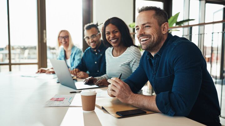 Diverse employees happy during a meeting