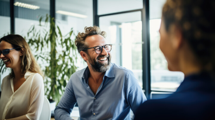 Employee smiling and looking away