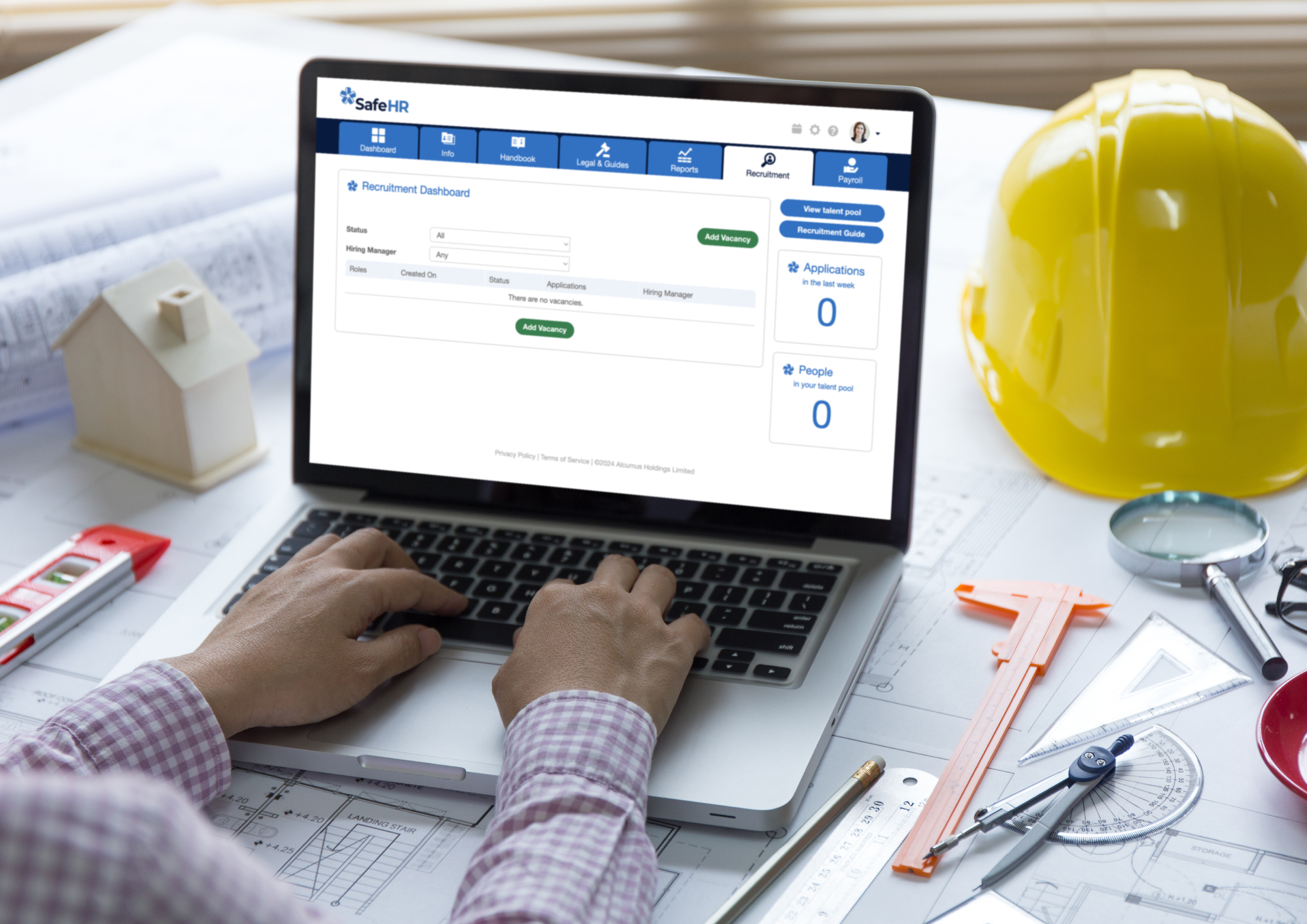 Laptop screen showing SafeHR software